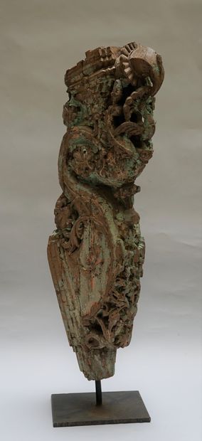 An architectural element in carved wood with...