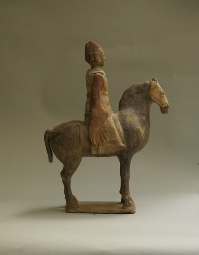 Beige terracotta rider with black, white...