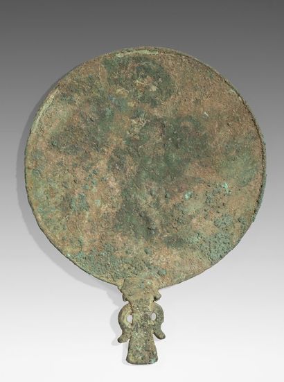 Mirror of circular shape, with an anthropomorphic...