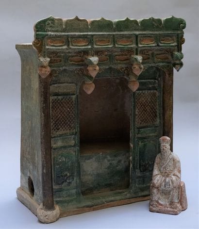 Votive house with character in green and...