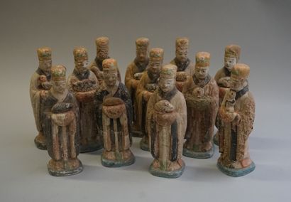Set of 12 statuettes showing the bearers...
