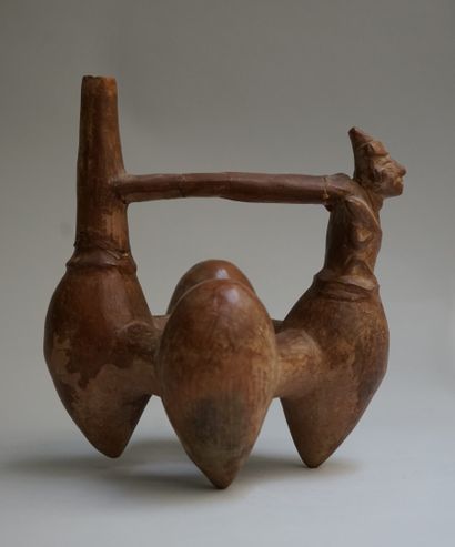 Whistling vase with four fruit-shaped feet,...