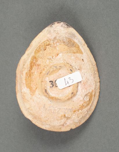 Beige terracotta oil lamp with circles decoration...