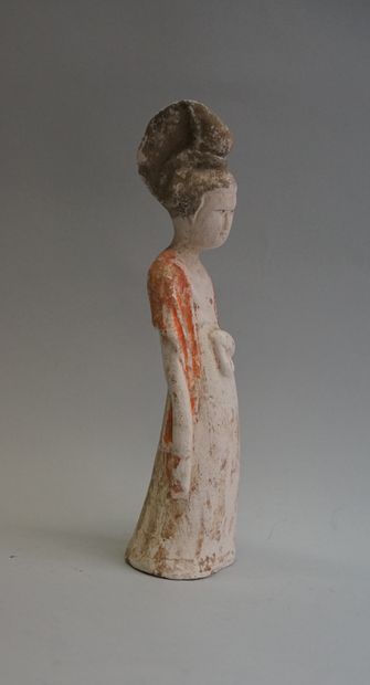 A beige terracotta court lady with white,...