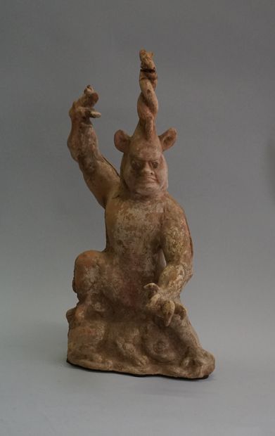 Beige and white terracotta one-horned chimera....