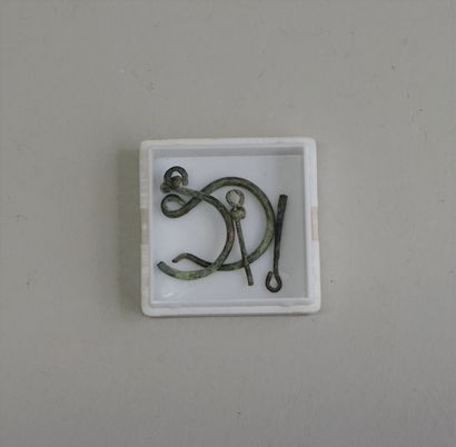 Two green patina bronze ? earrings. 

Roman...