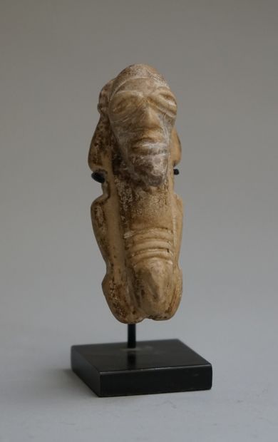 Zemi amulet in beige stone. 

Taino, before...