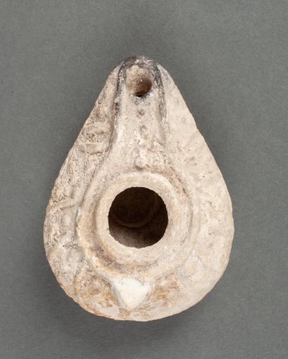 Oil lamp in beige terracotta decorated with...
