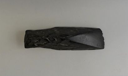 Polished gouge in black and brilliant stone....