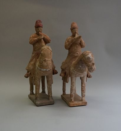 Set of four white, red and black polychrome...