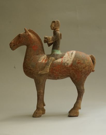 White, red, black and green polychrome terracotta...