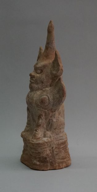 One-horned chimera in beige and white clay....