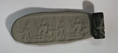 Cylinder seal in black hard stone with a...