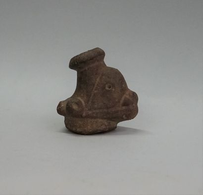 Anthropomorphic neck of a vase. Terracotta....