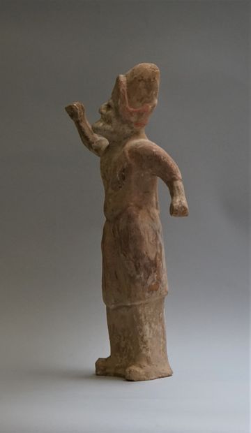 Beige terracotta shaman with white, red and...