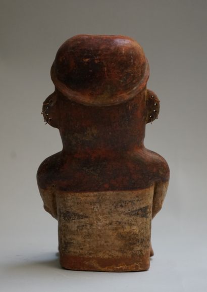 Anthropomorphic figure of a seated woman...