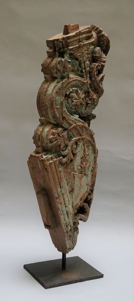 An architectural element in carved wood with...