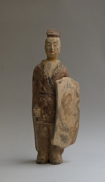 Beige terracotta warrior with red, black...