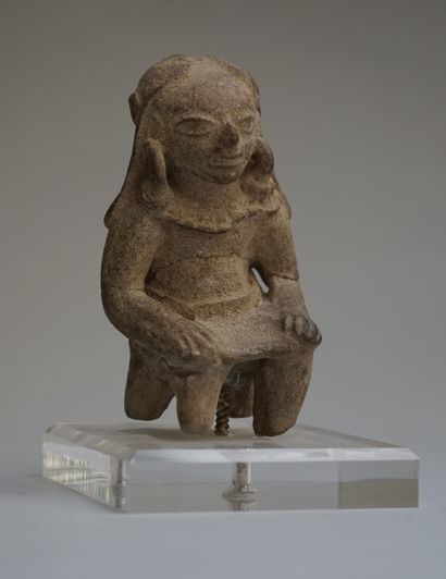 Anthropomorphic statuette showing a female...