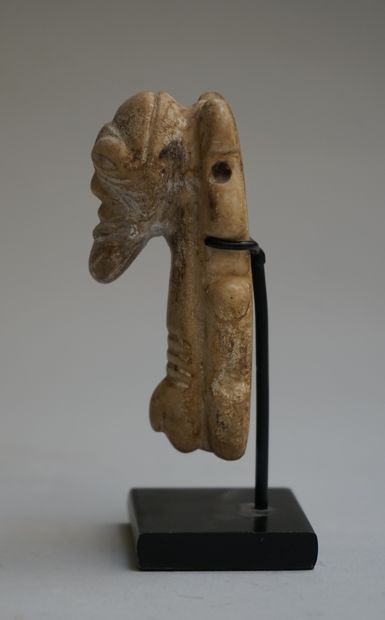Zemi amulet in beige stone. 

Taino, before...