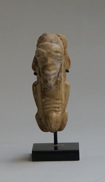 Zemi amulet in beige stone. 

Taino, before...