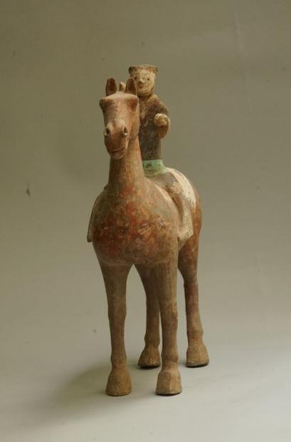 White, red, black and green polychrome terracotta...