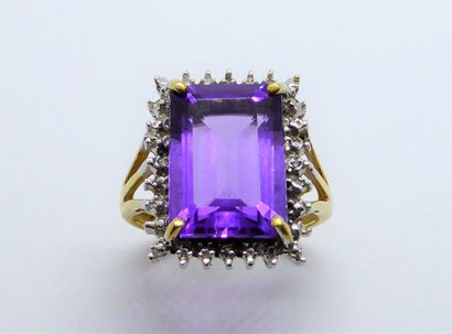 BAGUE en or jaune et or gris 18K (750/°°)...