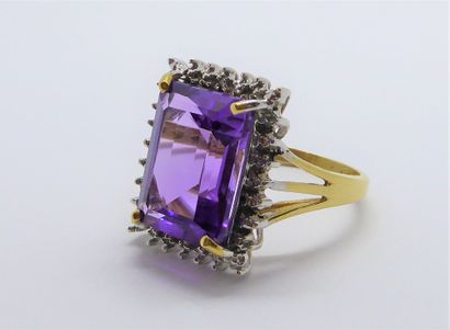BAGUE en or jaune et or gris 18K (750/°°)...