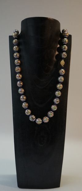 Beadwork with flower motifs. China, 20th...
