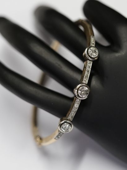 18k (750/°°) yellow gold and platinum rigid...