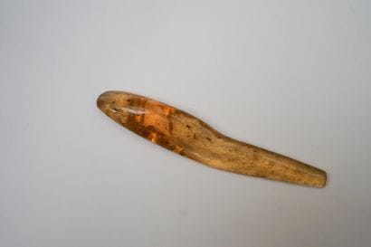 LARGE DROP of light honey amber containing...