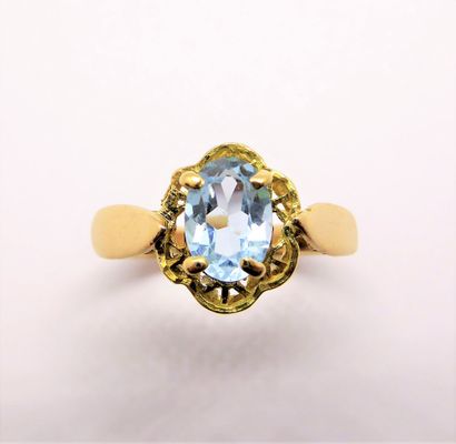 RING in 18K (750/°°) yellow gold, set with...