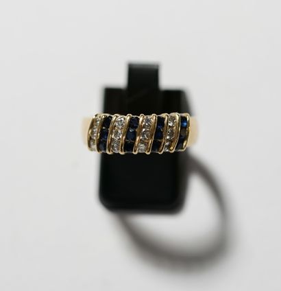 BAGUE jonc en or jaune 18k (750/°°) sertie...