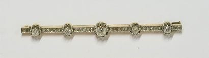 18k (750/°°) yellow gold and platinum BARRETTE...