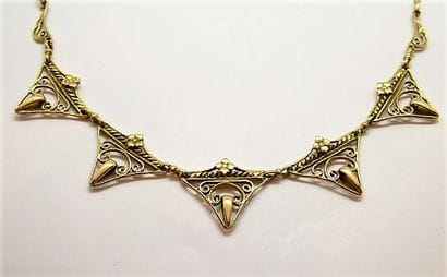 NECKLACE in 18k (750/°°) yellow gold, art...