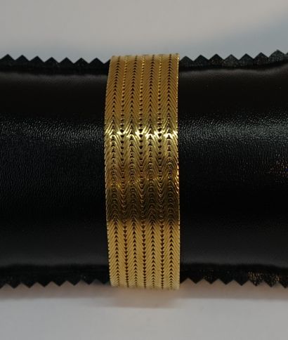 18k (750/°°) yellow gold ribbon BRACELET...