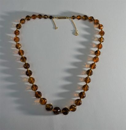 COLLIER composé de perles facettées de citrine...