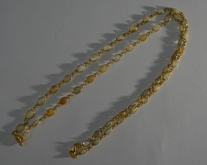 SAUTOIR en argent doré (vermeil) 925/°° composé...