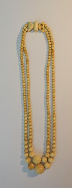 NECKLACE, double row of falling ivory balls....