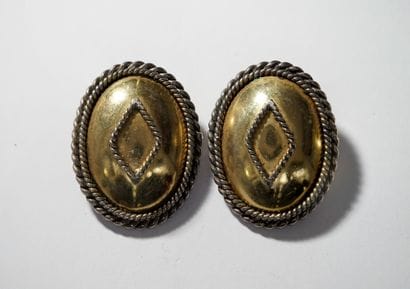 PAIR OF EAR CLIPS in gilt and silver plated...
