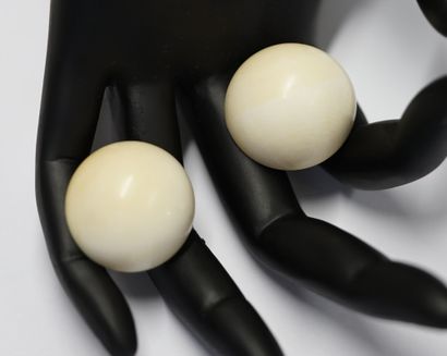 Pair of round ivory cabochon ear clips, metal...