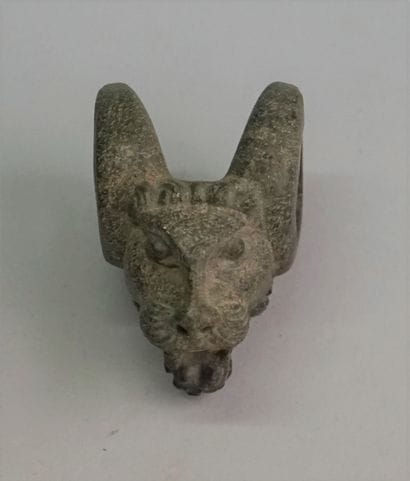 Lion head in light stone (basalt?) Persian...