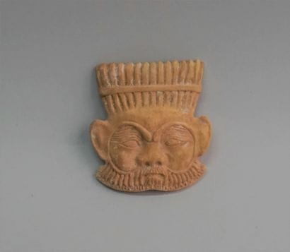 Bes legionnaire in bone. 7x6.5cm
