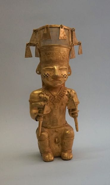 Large seated chief holding two scepters,...
