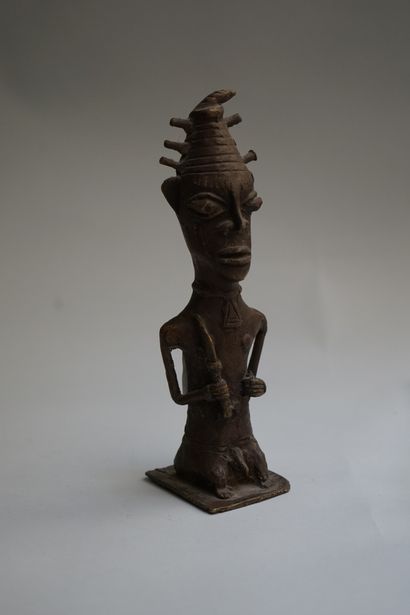 Anthropomorphic statuette of a sorcerer holding...