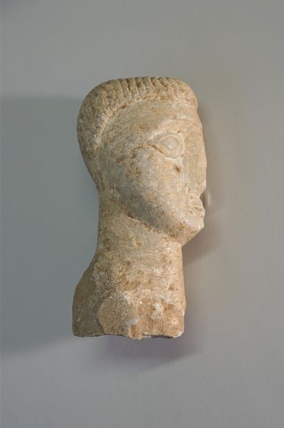 White stone (marble) head in Celtic styl...