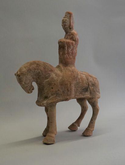 Polychrome terracotta priest on horseback....