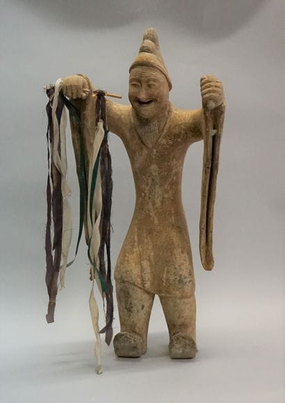 Comedian or dancer in beige terracotta with...
