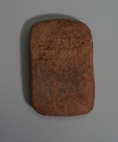 Clay tablet engraved with pictograms on both...