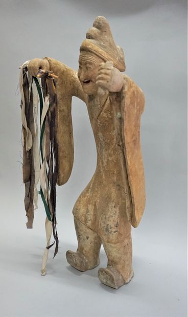 Comedian or dancer in beige terracotta with...
